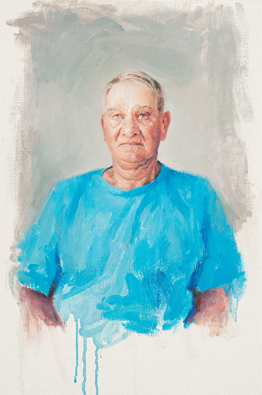 Portrait of man in blue T shirt. By Peter Mennim